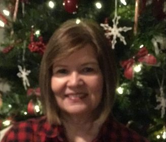 R holding Tabletop Nativity